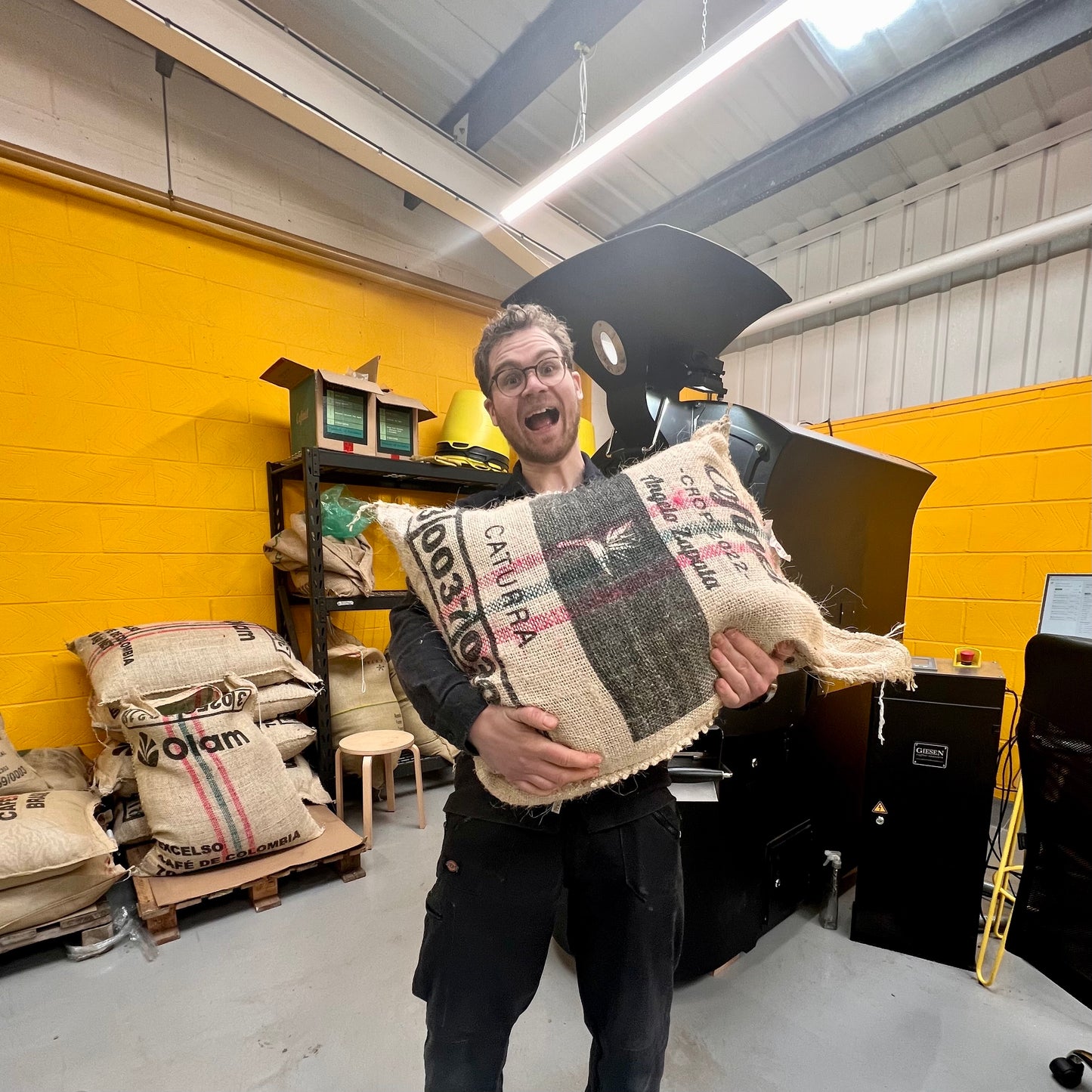 Angelo Zapata's coffee bag being held at Lost Sheep Coffee roastery in Kent