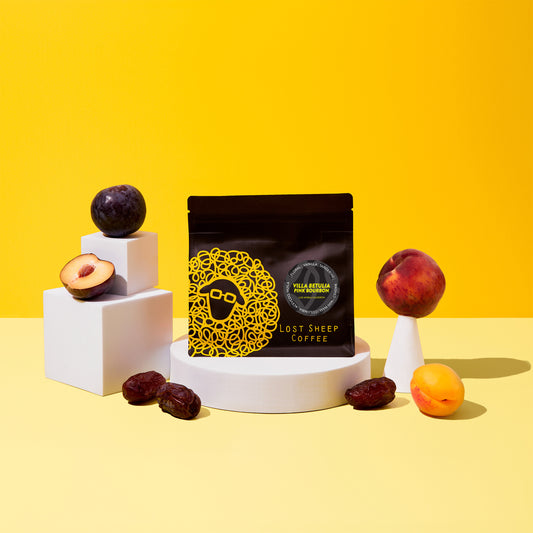 Lost Sheep Coffee packaging and fruit