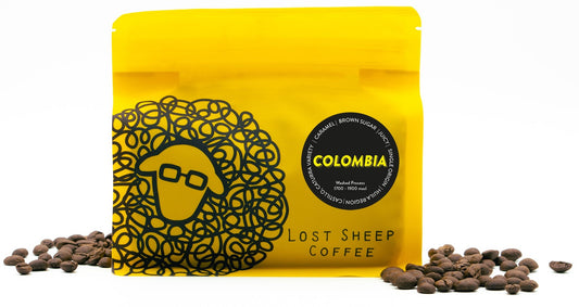 Colombia Huila coffee beans in yellow Lost Sheep Coffee packaging